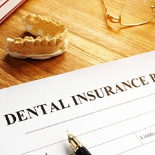 a dental insurance form being filled out