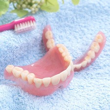 a pair of dentures on a towel