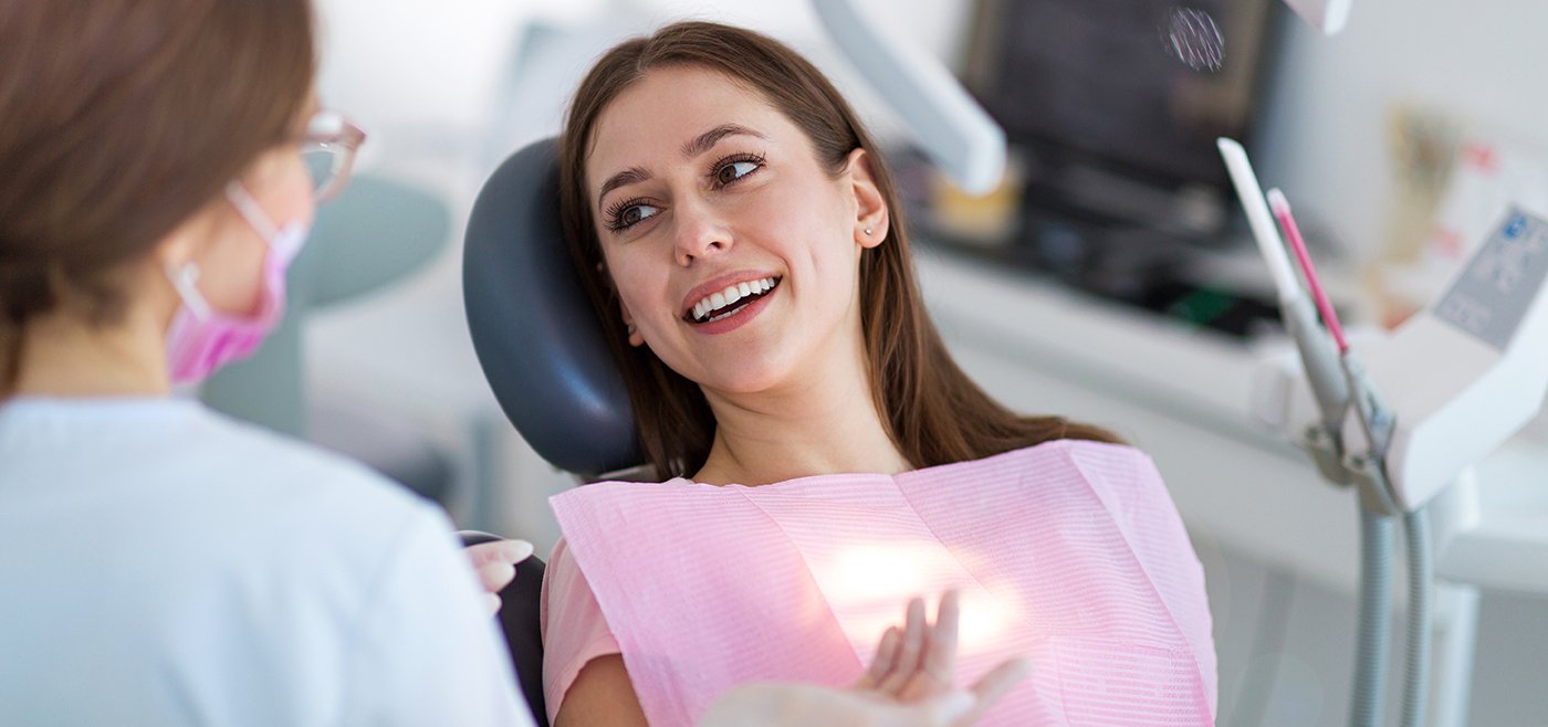 Woman smiling in the dental chair